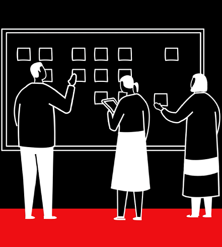 Abstract black-and-white composition featuring tall angular geometric blocks lit by dramatic light, creating sharp contrasts and deep shadows.