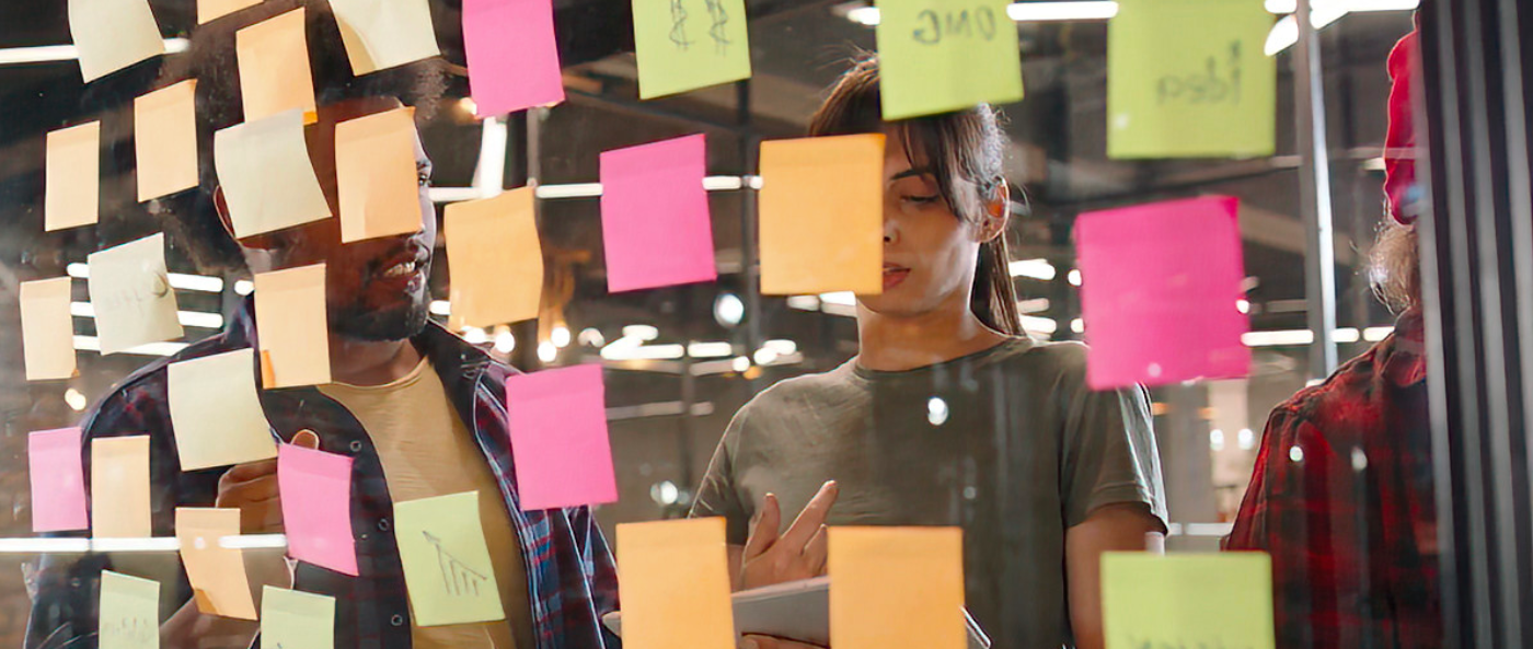 A sleek cosmetic bottle sits inside a pink rectangular box labeled Elegant, with soft shadows creating a clean, premium, and sophisticated product display.