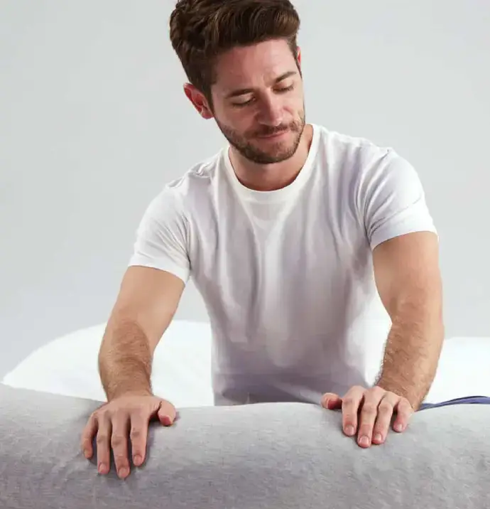 A sleek cosmetic bottle sits inside a pink rectangular box labeled Elegant, with soft shadows creating a clean, premium, and sophisticated product display.