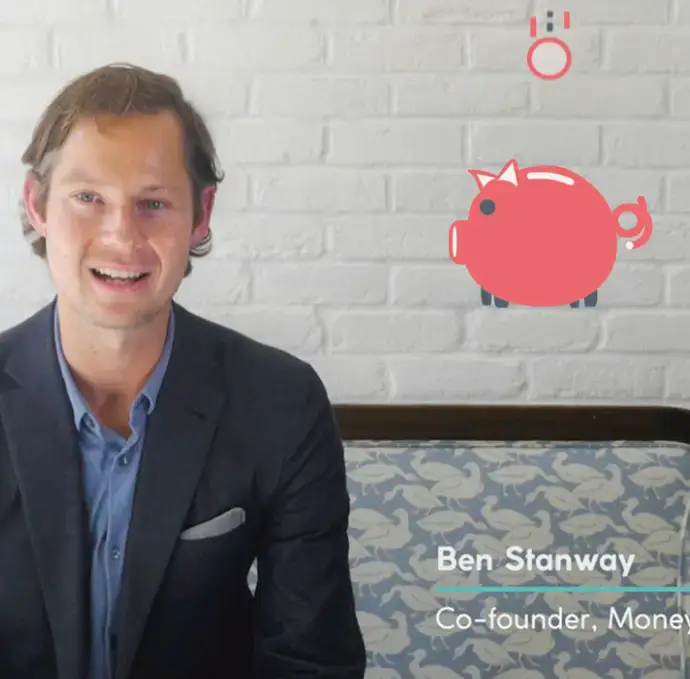 A minimal white Dior gift box with elegant black string and wax seal rests beside a matching card, creating a luxurious and refined presentation aesthetic.